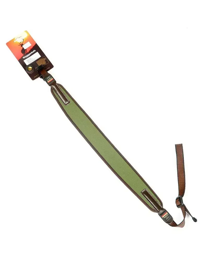 Zdjęcie pasa Niggeloh z boku, ukazujące mocny nylonowy pasek i szeroką, neoprenową wyściółkę z bawełnianym obszyciem. Wytrzymałe skórzane łatki i stalowe nity, idealne do noszenia ciężkich karabinów w trudnym terenie.