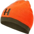 Czapka Härkila Aspire Beanie odwrócona na pomarańczową stronę (Hi-Vis) – jaskrawy kolor zapewnia maksymalne bezpieczeństwo i widoczność myśliwego podczas polowań zbiorowych.