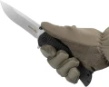 Nóż outdoorowy Skif Urbanite II SW Black w dłoni. Czarna rękojeść G-10 i jelec z flippera gwarantują bezpieczeństwo i pewny chwyt.